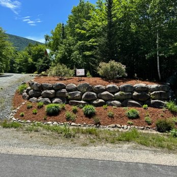BG Land Care - a stone wall in the middle of the road - Lawn Services Near Me BG Land Care - a stone wall in the middle of the road - Lawn Services Near Me