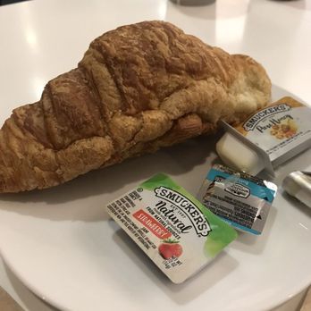 Alaska Lounge - C Concourse - A flaccid croissant with butter and jam/jelly - Airport Lounges Near Me - Seattle, Washington