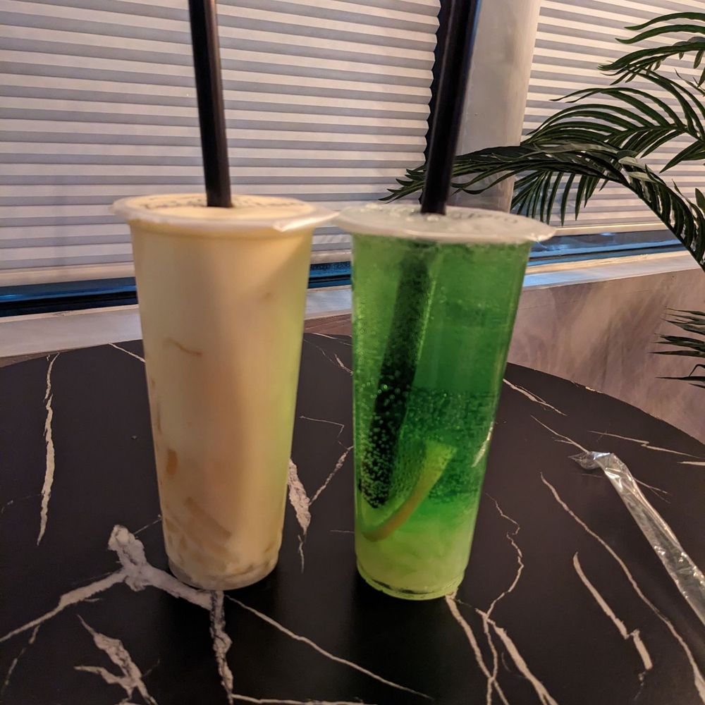 Mango coconut tea with lychee jelly and kumquat lime fruit tea Mango coconut tea with lychee jelly and kumquat lime fruit tea