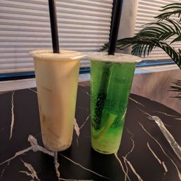 Mango coconut tea with lychee jelly and kumquat lime fruit tea Mango coconut tea with lychee jelly and kumquat lime fruit tea