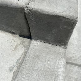 Concrete is not even up with the left side and surface is not smooth. There are a lot of residual concrete. Concrete is not even up with the left side and surface is not smooth. There are a lot of residual concrete.