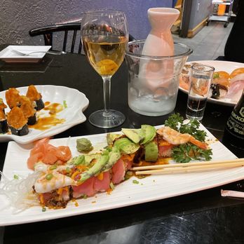 Umii Grill - a plate of sushi and a glass of wine - Japanese Near Me - Terre Haute, Indiana Umii Grill - a plate of sushi and a glass of wine - Japanese Near Me - Terre Haute, Indiana