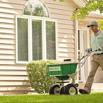 Spring-Green Lawn Care - a man mowing the lawn - Lawn Services Near Me - Valparaiso, Indiana Spring-Green Lawn Care - a man mowing the lawn - Lawn Services Near Me - Valparaiso, Indiana