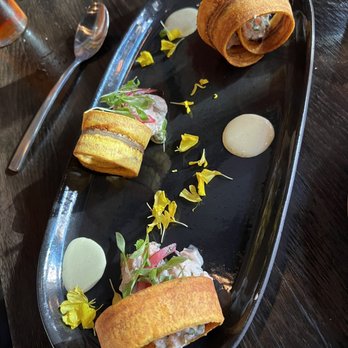 Parche - Salmon salpicon ceviche served with crispy plantain rings and jalapeño cilantro aioli - Colombian Near Me - Oakland, California Parche - Salmon salpicon ceviche served with crispy plantain rings and jalapeño cilantro aioli - Colombian Near Me - Oakland, California