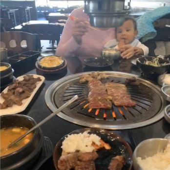 Gogiville - The meat is cooked in the grill in the middle of each table - Barbeque Near Me - Centreville, Virginia