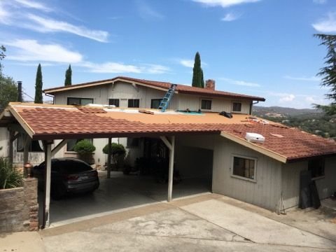 Slide of Eli Roofing