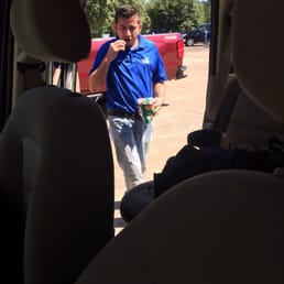 Eating potato chips while checking my car Eating potato chips while checking my car