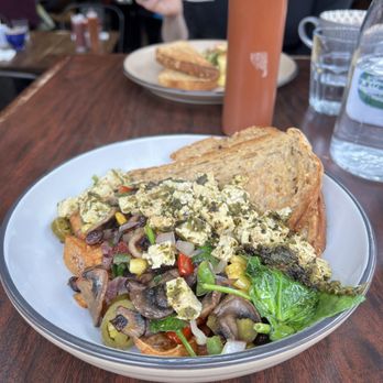 The Crabapple Cafe - Veggie hash with added chimichurri tofu scramble. - Breakfast & Brunch Near Me - Squamish, British Columbia The Crabapple Cafe - Veggie hash with added chimichurri tofu scramble. - Breakfast & Brunch Near Me - Squamish, British Columbia