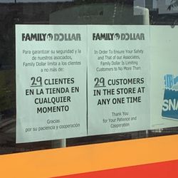 Family Dollar - Store capacity signage in store front window