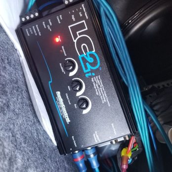 Calibred Customs - This LOC is nicely tucked in inside the trunk wall away from view. - Car Stereo Installation Near Me