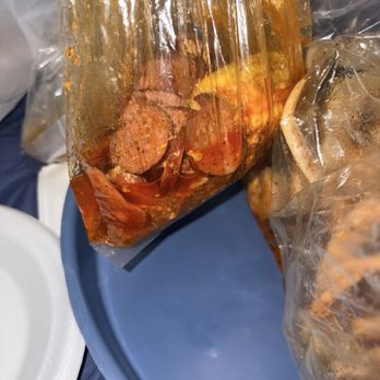 Surfing Crab - Sausage: Saucy San-Sauce swimming in sauce - Cajun/Creole Near Me - Round Rock, Texas Surfing Crab - Sausage: Saucy San-Sauce swimming in sauce - Cajun/Creole Near Me - Round Rock, Texas