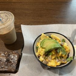 Scrambled egg bowl, chocolate chip banana bread, and expresso latte.