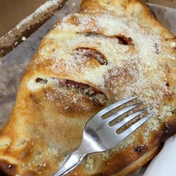 Milano's Pizza - Meatball Calzone with marinara inside!