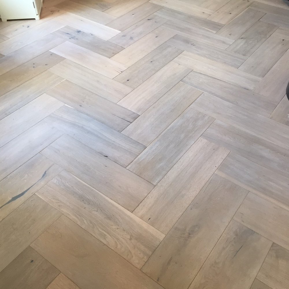 The beautiful herringbone pattern floor they laid despite the flooring not being made to be laid in this pattern! The beautiful herringbone pattern floor they laid despite the flooring not being made to be laid in this pattern!