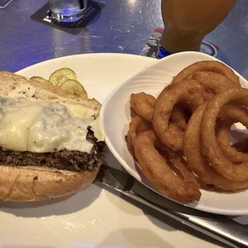 Yard House - House cheesesteak with onion rings - New American Near Me - Lynnfield, Massachusetts Yard House - House cheesesteak with onion rings - New American Near Me - Lynnfield, Massachusetts