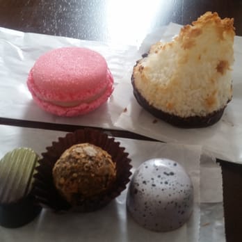 Christophe Artisan - Raspberry macaroon, coconut macaroon, mint chocolate, cappacino cheesecake, and a peanut butter chocolate. - Chocolatiers & Shops Near Me - Charleston, South Carolina