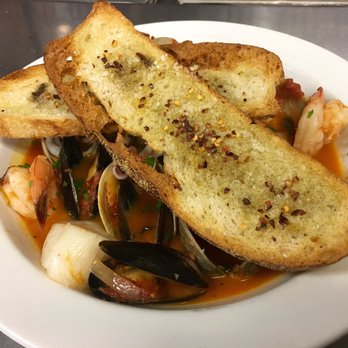 Maple Tree Cafe - The cioppino is delicious! It's topped with a seasoned crisp crouton which is perfect for the broth. - Italian Near Me - Simsbury, Connecticut