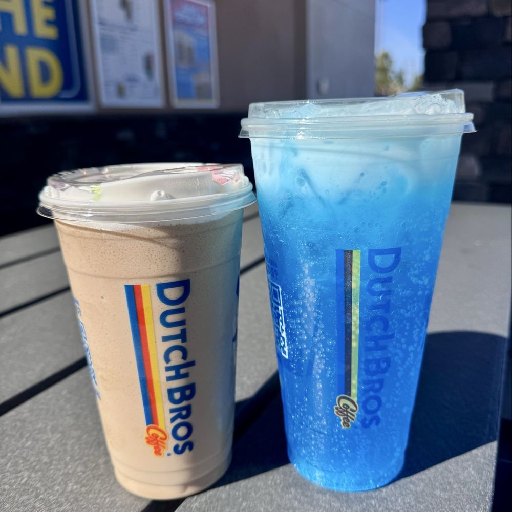 Dutch Bros Coffee - Marshmallow dream blended freeze and a sparkling vanilla blue raspberry with coconut syrup/milk - Juice Bars & Smoothies Near Me - Lake Elsinore, California Dutch Bros Coffee - Marshmallow dream blended freeze and a sparkling vanilla blue raspberry with coconut syrup/milk - Juice Bars & Smoothies Near Me - Lake Elsinore, California