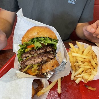 Bob's Atomic Burgers - Double burger with fries and onion strings - Burgers Near Me - Golden, Colorado Bob's Atomic Burgers - Double burger with fries and onion strings - Burgers Near Me - Golden, Colorado