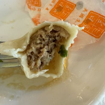 Hometown Dumpling - Lamb radish steamed dumpling after taking a bite - Juice Bars & Smoothies Near Me - Folsom, California Hometown Dumpling - Lamb radish steamed dumpling after taking a bite - Juice Bars & Smoothies Near Me - Folsom, California