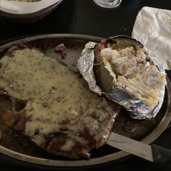 Tubby's Pub & Grub - Rib eye steak overloaded with butter sauce - American Near Me - Saint Charles, Missouri Tubby's Pub & Grub - Rib eye steak overloaded with butter sauce - American Near Me - Saint Charles, Missouri