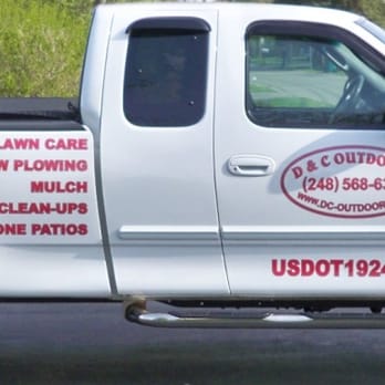 D & C Outdoors - a truck parked in a driveway - Tree Services Near Me D & C Outdoors - a truck parked in a driveway - Tree Services Near Me
