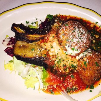 Rocco - costola di maiale e mozzarella fritte - pork rib chop/tomato sauce/fried mozzarella - Italian Near Me - Rochester, New York Rocco - costola di maiale e mozzarella fritte - pork rib chop/tomato sauce/fried mozzarella - Italian Near Me - Rochester, New York