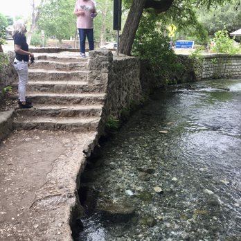 AT Your Service Tours - Teresa on the left at the head of the Comal River Springs in Lana Park. - Bus Tours Near Me AT Your Service Tours - Teresa on the left at the head of the Comal River Springs in Lana Park. - Bus Tours Near Me