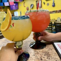 La Michoacana Taqueria And Mexican Snacks - Large peach margarita and jumbo strawberry margarita