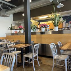 Plates & Palates - Seating and kitchen area
