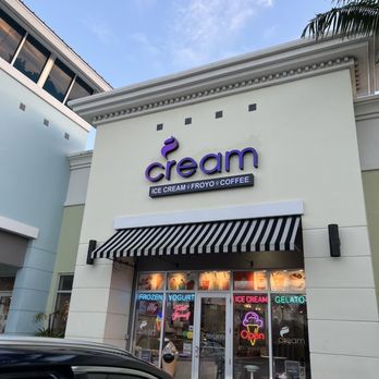 Cream - the front of a restaurant with a car parked in front of it - Coffee & Tea Near Me - Delray Beach, Florida Cream - the front of a restaurant with a car parked in front of it - Coffee & Tea Near Me - Delray Beach, Florida