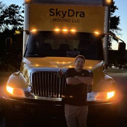 SkyDra Moving - Aaron in front of truck