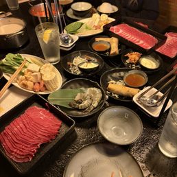 Tiger shrimp, sirloin cut, ebi ball appetizer, egg rolls, veggies mix & Mala broth hot pot. Tiger shrimp, sirloin cut, ebi ball appetizer, egg rolls, veggies mix & Mala broth hot pot.