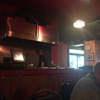 Janko's Little Zagreb - View from table of open flame grill - Steakhouses Near Me - Bloomington, Indiana Janko's Little Zagreb - View from table of open flame grill - Steakhouses Near Me - Bloomington, Indiana