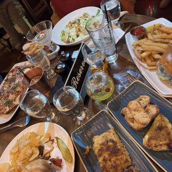 Lola's Lakehouse - Gouda potatoes, pistachio crusted brie, portabella mushroom, Caesar Salad, flatbread, prime rib sandwich (sub for gluten free) - American Near Me - Waconia, Minnesota Lola's Lakehouse - Gouda potatoes, pistachio crusted brie, portabella mushroom, Caesar Salad, flatbread, prime rib sandwich (sub for gluten free) - American Near Me - Waconia, Minnesota
