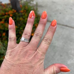 Angel Nails & Spa - Dip manicure, almond shaped with flower design on ring fingernail