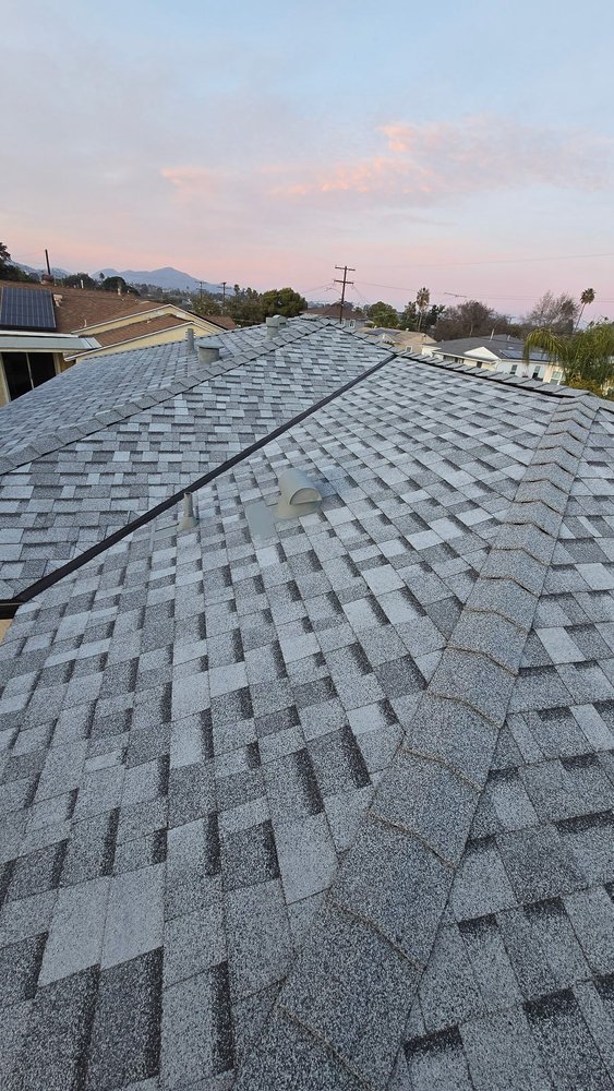 Slide of Vigil's Roofing