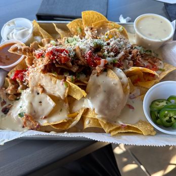 The Brass Tap - Chicken Nachos - Sports Bars Near Me - Hapeville, Georgia The Brass Tap - Chicken Nachos - Sports Bars Near Me - Hapeville, Georgia