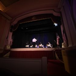 Corinth Coliseum Civic Center - The Corinth Symphony Orchestra plays a patriotic concert on stage at the Coliseum Theatre.