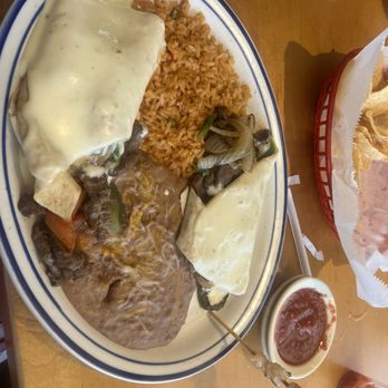 El Tequilazo - Steak Burrito topped with queso cheese, - Mexican Near Me - Grain Valley, Missouri