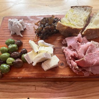 M'tucci's Twenty-Five - Charcuterie Board with Olives, house made butter, onion jam, Brie, Prosciutto and Bread - Italian Near Me - Albuquerque, New Mexico