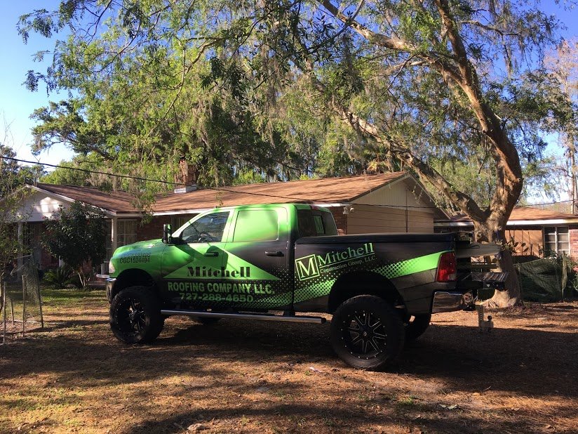 Slide of Mitchell Roofing Company