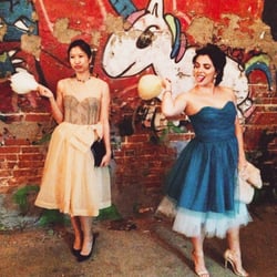 Me at the prom with Natalie who actually is loving her cotton candy despite the face.