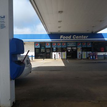 Marathon - a car parked in front of a food center - Gas Stations Near Me - Castleberry, Alabama