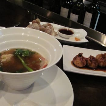 David's Dumpling & Noodle Bar - L-R(clockwise): wonton soup with Chinese greens, half-fried dumplings, fried wontons with sauce - Chinese Near Me - Raleigh, North Carolina David's Dumpling & Noodle Bar - L-R(clockwise): wonton soup with Chinese greens, half-fried dumplings, fried wontons with sauce - Chinese Near Me - Raleigh, North Carolina