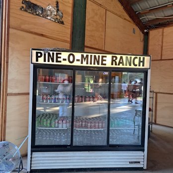 Pine-O-Mine Ranch - Pine-O-Mine beverage fridge with bottled water and soda cans - Fruits & Veggies Near Me - Placerville, California
