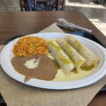 Tacos 4 Ever - Chicken enchilada combo w/cheese sauce and tomatio salsa. Wednesday special with drink for $10.50. - Tacos Near Me - Tulsa, Oklahoma Tacos 4 Ever - Chicken enchilada combo w/cheese sauce and tomatio salsa. Wednesday special with drink for $10.50. - Tacos Near Me - Tulsa, Oklahoma