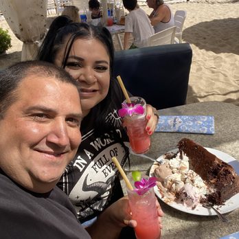 Paradise Cove Beach Cafe - The happy couple. 10 years of love sealed in cake and drinks. - American Near Me - Malibu, California Paradise Cove Beach Cafe - The happy couple. 10 years of love sealed in cake and drinks. - American Near Me - Malibu, California
