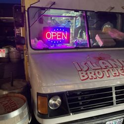 Island Brothers - Open sign.