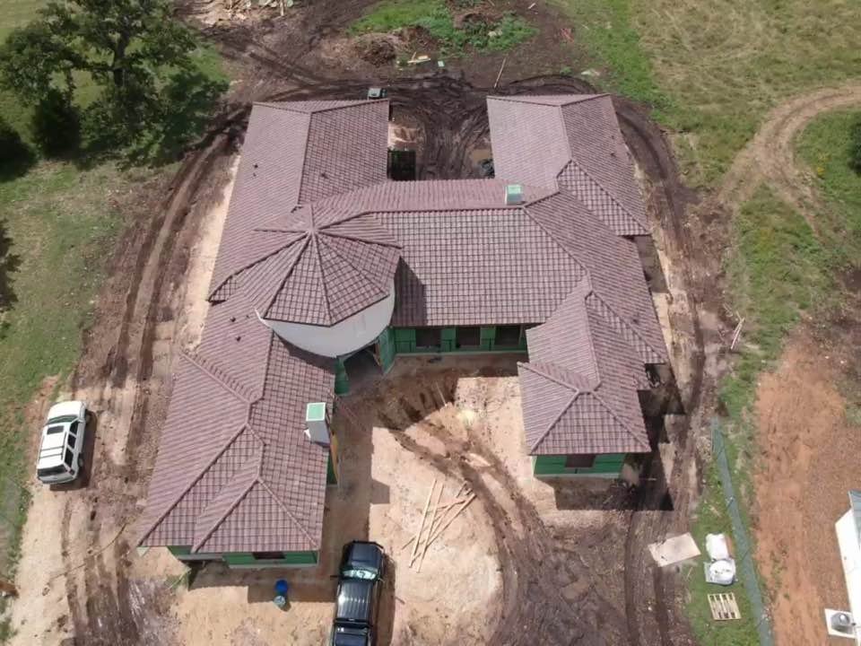 Slide of Texas Roofing and Restoration Services